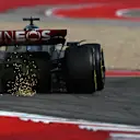 AUSTIN, TEXAS - OCTOBER 21: Sparks fly behind George Russell of Great Britain driving the (63) Mercedes AMG Petronas F1 Team W14 on track during the Sprint Shootout ahead of the F1 Grand Prix of United States at Circuit of The Americas on October 21, 2023 in Austin, Texas. (Photo by Clive Mason - Formula 1/Formula 1 via Getty Images)
