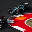 AUSTIN, TEXAS - OCTOBER 21: Daniel Ricciardo of Australia driving the (3) Scuderia AlphaTauri AT04 leads Lance Stroll of Canada driving the (18) Aston Martin AMR23 Mercedes during the Sprint ahead of the F1 Grand Prix of United States at Circuit of The Americas on October 21, 2023 in Austin, Texas. (Photo by Jared C. Tilton - Formula 1/Formula 1 via Getty Images)