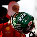 AUSTIN, TEXAS - OCTOBER 21: A detailed view of the race helmet of Charles Leclerc of Monaco and Ferrari as he prepares to drive on the grid prior to the Sprint ahead of the F1 Grand Prix of United States at Circuit of The Americas on October 21, 2023 in Austin, Texas. (Photo by Chris Graythen/Getty Images)