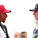 AUSTIN, TEXAS - OCTOBER 21: Sprint winner Max Verstappen of the Netherlands and Oracle Red Bull Racing and Second placed Lewis Hamilton of Great Britain and Mercedes talk in parc ferme after the Sprint ahead of the F1 Grand Prix of United States at Circuit of The Americas on October 21, 2023 in Austin, Texas. (Photo by Dan Istitene - Formula 1/Formula 1 via Getty Images)