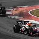 AUSTIN, TEXAS - OCTOBER 21: Sergio Perez of Mexico driving the (11) Oracle Red Bull Racing RB19 leads George Russell of Great Britain driving the (63) Mercedes AMG Petronas F1 Team W14 during the Sprint ahead of the F1 Grand Prix of United States at Circuit of The Americas on October 21, 2023 in Austin, Texas. (Photo by Clive Mason - Formula 1/Formula 1 via Getty Images)