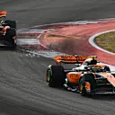 AUSTIN, TEXAS - OCTOBER 21: Lando Norris of Great Britain driving the (4) McLaren MCL60 Mercedes leads Oscar Piastri of Australia driving the (81) McLaren MCL60 Mercedes during the Sprint ahead of the F1 Grand Prix of United States at Circuit of The Americas on October 21, 2023 in Austin, Texas. (Photo by Clive Mason - Formula 1/Formula 1 via Getty Images)