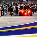 SINGAPORE, SINGAPORE - SEPTEMBER 22: Valtteri Bottas of Finland driving the (77) Kick Sauber C44 Ferrari arrives on the grid prior to the F1 Grand Prix of Singapore at Marina Bay Street Circuit on September 22, 2024 in Singapore, Singapore. (Photo by Pauline Ballet - Formula 1/Formula 1 via Getty Images)