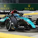 SINGAPORE, SINGAPORE - SEPTEMBER 22: George Russell of Great Britain driving the (63) Mercedes AMG Petronas F1 Team W15 runs wide during the F1 Grand Prix of Singapore at Marina Bay Street Circuit on September 22, 2024 in Singapore, Singapore. (Photo by Clive Rose - Formula 1/Formula 1 via Getty Images)