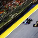 SINGAPORE, SINGAPORE - SEPTEMBER 22: Max Verstappen of the Netherlands driving the (1) Oracle Red Bull Racing RB20 overtakes Pierre Gasly of France driving the (10) Alpine F1 A524 Renault on track during the F1 Grand Prix of Singapore at Marina Bay Street Circuit on September 22, 2024 in Singapore, Singapore. (Photo by Lars Baron - Formula 1/Formula 1 via Getty Images)