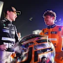 SINGAPORE, SINGAPORE - SEPTEMBER 22: Race winner Lando Norris of Great Britain and McLaren and Third placed Oscar Piastri of Australia driving the (81) McLaren MCL38 Mercedes celebrate in parc ferme during the F1 Grand Prix of Singapore at Marina Bay Street Circuit on September 22, 2024 in Singapore, Singapore. (Photo by Clive Rose - Formula 1/Formula 1 via Getty Images)
