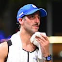 SINGAPORE, SINGAPORE - SEPTEMBER 22: 18th Placed Daniel Ricciardo of Australia and Visa Cash App RB looks on in the Paddock after the F1 Grand Prix of Singapore at Marina Bay Street Circuit on September 22, 2024 in Singapore, Singapore. (Photo by Rudy Carezzevoli/Getty Images)