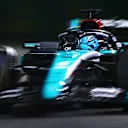 SINGAPORE, SINGAPORE - SEPTEMBER 20: George Russell of Great Britain driving the (63) Mercedes AMG Petronas F1 Team W15 on track during practice ahead of the F1 Grand Prix of Singapore at Marina Bay Street Circuit on September 20, 2024 in Singapore, Singapore. (Photo by Mark Thompson/Getty Images)