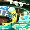 SINGAPORE, SINGAPORE - SEPTEMBER 21: Fernando Alonso of Spain and Aston Martin F1 Team prepares to drive in the garage during final practice ahead of the F1 Grand Prix of Singapore at Marina Bay Street Circuit on September 21, 2024 in Singapore, Singapore. (Photo by Clive Rose - Formula 1/Formula 1 via Getty Images)