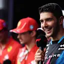 SINGAPORE, SINGAPORE - SEPTEMBER 21: Esteban Ocon of France and Alpine F1 talks to the crowd on the fan stage prior to final practice ahead of the F1 Grand Prix of Singapore at Marina Bay Street Circuit on September 21, 2024 in Singapore, Singapore. (Photo by Lars Baron - Formula 1/Formula 1 via Getty Images)