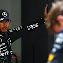 SINGAPORE, SINGAPORE - SEPTEMBER 21: Third placed qualifier Lewis Hamilton of Great Britain and Mercedes looks on in parc ferme during qualifying ahead of the F1 Grand Prix of Singapore at Marina Bay Street Circuit on September 21, 2024 in Singapore, Singapore. (Photo by Mark Thompson/Getty Images)