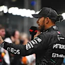 SINGAPORE, SINGAPORE - SEPTEMBER 21: Third placed qualifier Lewis Hamilton of Great Britain and Mercedes talks to the media in parc ferme during qualifying ahead of the F1 Grand Prix of Singapore at Marina Bay Street Circuit on September 21, 2024 in Singapore, Singapore. (Photo by Rudy Carezzevoli/Getty Images)
