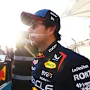 ABU DHABI, UNITED ARAB EMIRATES - DECEMBER 08: Sergio Perez of Mexico and Oracle Red Bull Racing prepares to drive on the grid prior to the F1 Grand Prix of Abu Dhabi at Yas Marina Circuit on December 08, 2024 in Abu Dhabi, United Arab Emirates. (Photo by Mark Thompson/Getty Images)