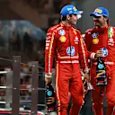 ABU DHABI, UNITED ARAB EMIRATES - DECEMBER 08: Second placed Carlos Sainz of Spain and Ferrari and Third placed Charles Leclerc of Monaco and Ferrari celebrate on the podium during the F1 Grand Prix of Abu Dhabi at Yas Marina Circuit on December 08, 2024 in Abu Dhabi, United Arab Emirates. (Photo by Bryn Lennon - Formula 1/Formula 1 via Getty Images)