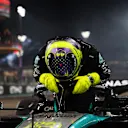 ABU DHABI, UNITED ARAB EMIRATES - DECEMBER 08: 4th placed Lewis Hamilton of Great Britain and Mercedes reacts after performing donuts on track for his final race with Mercedes during the F1 Grand Prix of Abu Dhabi at Yas Marina Circuit on December 08, 2024 in Abu Dhabi, United Arab Emirates. (Photo by Bryn Lennon - Formula 1/Formula 1 via Getty Images)