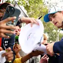MELBOURNE, AUSTRALIA - MARCH 24: Logan Sargeant of United States and Williams greets fans on the Melbourne Walk prior to the F1 Grand Prix of Australia at Albert Park Circuit on March 24, 2024 in Melbourne, Australia. (Photo by Clive Mason - Formula 1/Formula 1 via Getty Images)