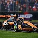 MELBOURNE, AUSTRALIA - MARCH 24: Oscar Piastri of Australia driving the (81) McLaren MCL38 Mercedes runs wide onto the grass during the F1 Grand Prix of Australia at Albert Park Circuit on March 24, 2024 in Melbourne, Australia. (Photo by Quinn Rooney - Formula 1/Formula 1 via Getty Images)