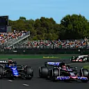 MELBOURNE, AUSTRALIA - MARCH 24: Alexander Albon of Thailand driving the (23) Williams FW46 Mercedes and Esteban Ocon of France driving the (31) Alpine F1 A524 Renault battle for track position during the F1 Grand Prix of Australia at Albert Park Circuit on March 24, 2024 in Melbourne, Australia. (Photo by Clive Mason - Formula 1/Formula 1 via Getty Images)