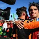 MELBOURNE, AUSTRALIA - MARCH 24: Race winner Carlos Sainz of Spain and Ferrari and Third placed Lando Norris of Great Britain and McLaren celebrate in parc ferme during the F1 Grand Prix of Australia at Albert Park Circuit on March 24, 2024 in Melbourne, Australia. (Photo by Clive Mason - Formula 1/Formula 1 via Getty Images)