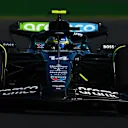 MELBOURNE, AUSTRALIA - MARCH 22: Fernando Alonso of Spain driving the (14) Aston Martin AMR24 Mercedes on track during practice ahead of the F1 Grand Prix of Australia at Albert Park Circuit on March 22, 2024 in Melbourne, Australia. (Photo by Clive Mason - Formula 1/Formula 1 via Getty Images)