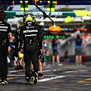 MELBOURNE, AUSTRALIA - MARCH 23: 11th placed qualifier Lewis Hamilton of Great Britain and Mercedes walks in the Pitlane during qualifying ahead of the F1 Grand Prix of Australia at Albert Park Circuit on March 23, 2024 in Melbourne, Australia. (Photo by Mark Thompson/Getty Images)