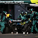 BAKU, AZERBAIJAN - SEPTEMBER 15: Lance Stroll of Canada driving the (18) Aston Martin AMR24 Mercedes makes a pitstop during the F1 Grand Prix of Azerbaijan at Baku City Circuit on September 15, 2024 in Baku, Azerbaijan. (Photo by Dan Mullan/Getty Images)