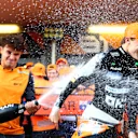 BAKU, AZERBAIJAN - SEPTEMBER 15: Race winner Oscar Piastri of Australia and McLaren and 4th placed Lando Norris of Great Britain and McLaren celebrate with their team in the Pitlane after the F1 Grand Prix of Azerbaijan at Baku City Circuit on September 15, 2024 in Baku, Azerbaijan. (Photo by Clive Rose - Formula 1/Formula 1 via Getty Images)