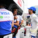 BAKU, AZERBAIJAN - SEPTEMBER 14: Daniel Ricciardo of Australia and Visa Cash App RB talks with race engineer Pierre Hamelin on the pitwall during final practice ahead of the F1 Grand Prix of Azerbaijan at Baku City Circuit on September 14, 2024 in Baku, Azerbaijan. (Photo by Rudy Carezzevoli/Getty Images)