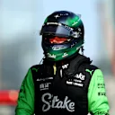 BAKU, AZERBAIJAN - SEPTEMBER 14: 18th placed qualifier Valtteri Bottas of Finland and Stake F1 Team Kick Sauber walks in the Pitlane during qualifying ahead of the F1 Grand Prix of Azerbaijan at Baku City Circuit on September 14, 2024 in Baku, Azerbaijan. (Photo by Clive Rose - Formula 1/Formula 1 via Getty Images)
