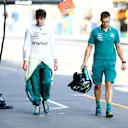 BAKU, AZERBAIJAN - SEPTEMBER 14: 15th placed qualifier Lance Stroll of Canada and Aston Martin F1 Team walks in the Pitlane during qualifying ahead of the F1 Grand Prix of Azerbaijan at Baku City Circuit on September 14, 2024 in Baku, Azerbaijan. (Photo by Clive Rose - Formula 1/Formula 1 via Getty Images)