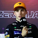 BAKU, AZERBAIJAN - SEPTEMBER 14: Second placed qualifier Oscar Piastri of Australia and McLaren attends the press conference after qualifying ahead of the F1 Grand Prix of Azerbaijan at Baku City Circuit on September 14, 2024 in Baku, Azerbaijan. (Photo by Clive Rose/Getty Images)