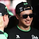 BAHRAIN, BAHRAIN - MARCH 02: Zhou Guanyu of China and Stake F1 Team Kick Sauber and Valtteri Bottas of Finland and Stake F1 Team Kick Sauber talk prior to the F1 Grand Prix of Bahrain at Bahrain International Circuit on March 02, 2024 in Bahrain, Bahrain. (Photo by Peter Fox - Formula 1/Formula 1 via Getty Images)