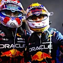 BAHRAIN, BAHRAIN - MARCH 02: Race winner Max Verstappen of the Netherlands and Oracle Red Bull Racing and Second placed Sergio Perez of Mexico and Oracle Red Bull Racing celebrate in parc ferme during the F1 Grand Prix of Bahrain at Bahrain International Circuit on March 02, 2024 in Bahrain, Bahrain. (Photo by Mark Thompson/Getty Images)