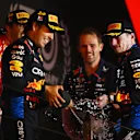 BAHRAIN, BAHRAIN - MARCH 02: Race winner Max Verstappen of the Netherlands and Oracle Red Bull Racing, Second placed Sergio Perez of Mexico and Oracle Red Bull Racing, Third placed Carlos Sainz of Spain and Ferrari and Tom Hart, Performance Engineer at Oracle Red BullÂ Racing celebrate on the podium during the F1 Grand Prix of Bahrain at Bahrain International Circuit on March 02, 2024 in Bahrain, Bahrain. (Photo by Clive Mason/Getty Images)