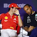 BAHRAIN, BAHRAIN - FEBRUARY 28: Carlos Sainz of Spain and Ferrari and Lewis Hamilton of Great Britain and Mercedes attend the Drivers Press Conference during previews ahead of the F1 Grand Prix of Bahrain at Bahrain International Circuit on February 28, 2024 in Bahrain, Bahrain. (Photo by Clive Rose/Getty Images)