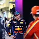 BAHRAIN, BAHRAIN - MARCH 01: Pole position qualifier Max Verstappen of the Netherlands and Oracle Red Bull Racing talks with Second placed qualifier Charles Leclerc of Monaco and Ferrari and Third placed qualifier George Russell of Great Britain and Mercedes in parc ferme during qualifying ahead of the F1 Grand Prix of Bahrain at Bahrain International Circuit on March 01, 2024 in Bahrain, Bahrain. (Photo by Mark Thompson/Getty Images)