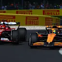 SPA, BELGIUM - JULY 28: Oscar Piastri of Australia driving the (81) McLaren MCL38 Mercedes overtakes Charles Leclerc of Monaco driving the (16) Ferrari SF-24 for third position during the F1 Grand Prix of Belgium at Circuit de Spa-Francorchamps on July 28, 2024 in Spa, Belgium. (Photo by Joe Portlock - Formula 1/Formula 1 via Getty Images)