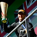 SPA, BELGIUM - JULY 28: Race winner George Russell of Great Britain and Mercedes celebrates on the podium during the F1 Grand Prix of Belgium at Circuit de Spa-Francorchamps on July 28, 2024 in Spa, Belgium. (Photo by James Sutton - Formula 1/Formula 1 via Getty Images)
