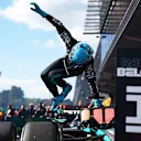 SPA, BELGIUM - JULY 28: Race winner George Russell of Great Britain and Mercedes jumps out of his car as he celebrates in parc ferme during the F1 Grand Prix of Belgium at Circuit de Spa-Francorchamps on July 28, 2024 in Spa, Belgium. (Photo by Bryn Lennon - Formula 1/Formula 1 via Getty Images)