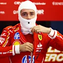 SPA, BELGIUM - JULY 26: Charles Leclerc of Monaco and Ferrari prepares to drive in the garage during practice ahead of the F1 Grand Prix of Belgium at Circuit de Spa-Francorchamps on July 26, 2024 in Spa, Belgium. (Photo by Mark Thompson/Getty Images)
