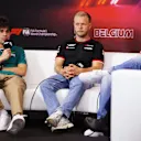 SPA, BELGIUM - JULY 25: Lance Stroll of Canada and Aston Martin F1 Team talks in the Drivers Press Conference with Kevin Magnussen of Denmark and Haas F1 during previews ahead of the F1 Grand Prix of Belgium at Circuit de Spa-Francorchamps on July 25, 2024 in Spa, Belgium. (Photo by Dean Mouhtaropoulos/Getty Images)
