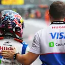 SPA, BELGIUM - JULY 27: 18th placed qualifier Yuki Tsunoda of Japan and Visa Cash App RB walks in the Pitlane during qualifying ahead of the F1 Grand Prix of Belgium at Circuit de Spa-Francorchamps on July 27, 2024 in Spa, Belgium. (Photo by Rudy Carezzevoli/Getty Images)