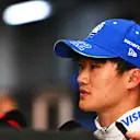 SAO PAULO, BRAZIL - NOVEMBER 01: 18th placed qualifier Yuki Tsunoda of Japan and Visa Cash App RB talks to the media in the Paddock during Sprint Qualifying ahead of the F1 Grand Prix of Brazil at Autodromo Jose Carlos Pace on November 01, 2024 in Sao Paulo, Brazil. (Photo by Rudy Carezzevoli/Getty Images)