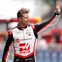 SAO PAULO, BRAZIL - NOVEMBER 01: 12th placed qualifier Nico Hulkenberg of Germany and Haas F1 waves to the crowd from the pitlane during Sprint Qualifying ahead of the F1 Grand Prix of Brazil at Autodromo Jose Carlos Pace on November 01, 2024 in Sao Paulo, Brazil. (Photo by Lars Baron - Formula 1/Formula 1 via Getty Images)