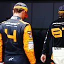 SAO PAULO, BRAZIL - NOVEMBER 02: Sprint winner Lando Norris of Great Britain and McLaren and Second placed Oscar Piastri of Australia and McLaren walk in parc ferme during the Sprint ahead of the F1 Grand Prix of Brazil at Autodromo Jose Carlos Pace on November 02, 2024 in Sao Paulo, Brazil. (Photo by Mark Thompson/Getty Images)