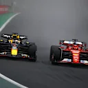 SAO PAULO, BRAZIL - NOVEMBER 03: Charles Leclerc of Monaco driving the (16) Ferrari SF-24 and Max Verstappen of the Netherlands driving the (1) Oracle Red Bull Racing RB20 battle for position during the F1 Grand Prix of Brazil at Autodromo Jose Carlos Pace on November 03, 2024 in Sao Paulo, Brazil. (Photo by Mark Thompson/Getty Images)