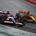 SAO PAULO, BRAZIL - NOVEMBER 03: Liam Lawson of New Zealand driving the (30) Visa Cash App RB VCARB 01 leads Oscar Piastri of Australia driving the (81) McLaren MCL38 Mercedes during the F1 Grand Prix of Brazil at Autodromo Jose Carlos Pace on November 03, 2024 in Sao Paulo, Brazil. (Photo by Mark Thompson/Getty Images)