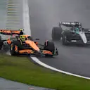 SAO PAULO, BRAZIL - NOVEMBER 03: Lando Norris of Great Britain driving the (4) McLaren MCL38 Mercedes rejoins the track ahead of George Russell of Great Britain driving the (63) Mercedes AMG Petronas F1 Team W15 during the F1 Grand Prix of Brazil at Autodromo Jose Carlos Pace on November 03, 2024 in Sao Paulo, Brazil. (Photo by Clive Mason/Getty Images)