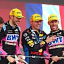 SAO PAULO, BRAZIL - NOVEMBER 03: Race winner Max Verstappen of the Netherlands and Oracle Red Bull Racing, Second placed Esteban Ocon of France and Alpine F1 and Third placed Pierre Gasly of France and Alpine F1 celebrate on the podium after the F1 Grand Prix of Brazil at Autodromo Jose Carlos Pace on November 03, 2024 in Sao Paulo, Brazil. (Photo by Peter Fox - Formula 1/Formula 1 via Getty Images)