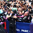 SAO PAULO, BRAZIL - NOVEMBER 03: Second placed Esteban Ocon of France and Alpine F1 and Third placed Pierre Gasly of France and Alpine F1 celebrate with their team in parc ferme during the F1 Grand Prix of Brazil at Autodromo Jose Carlos Pace on November 03, 2024 in Sao Paulo, Brazil. (Photo by Peter Fox - Formula 1/Formula 1 via Getty Images)